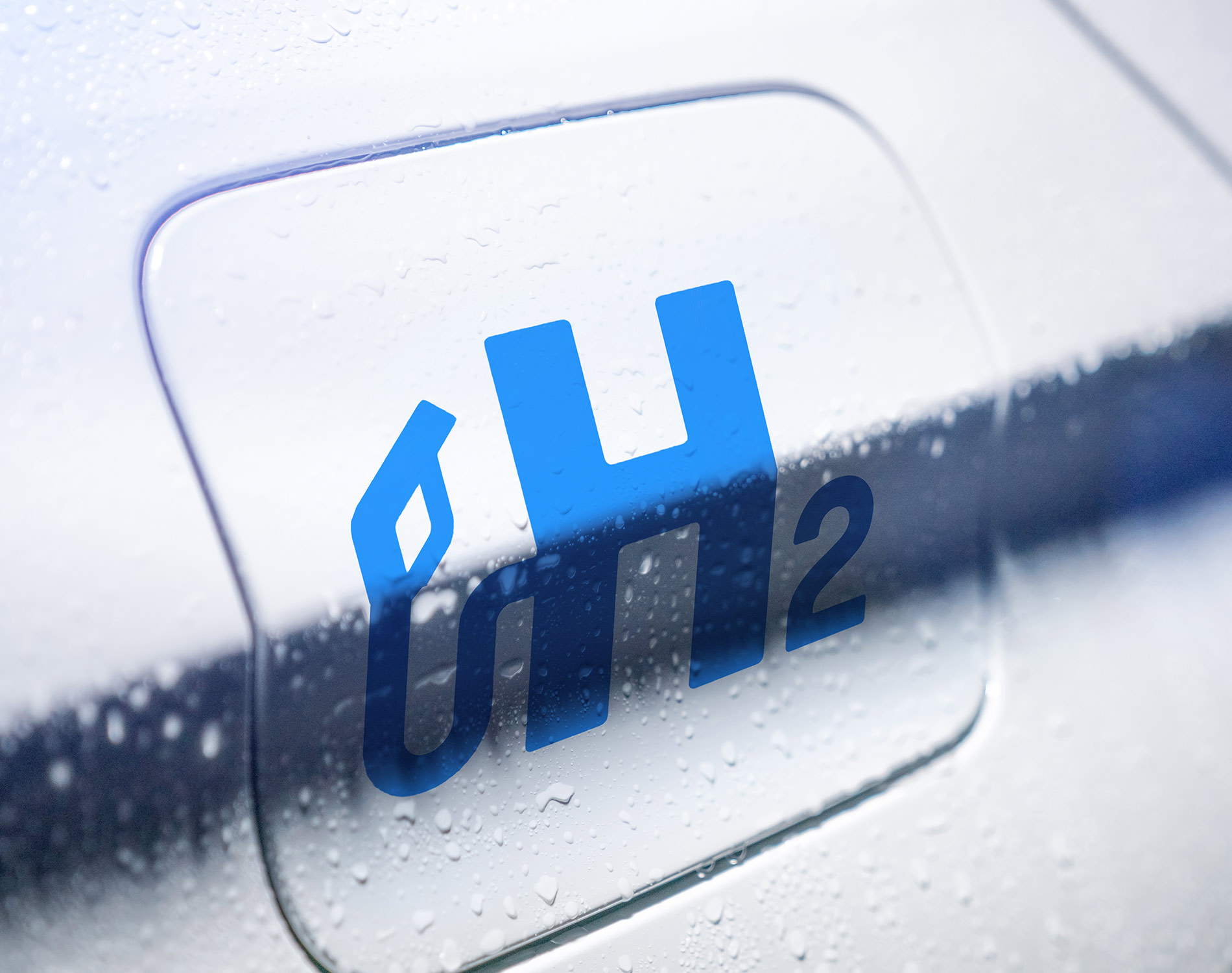 Car with hydrogen logo on filler cap