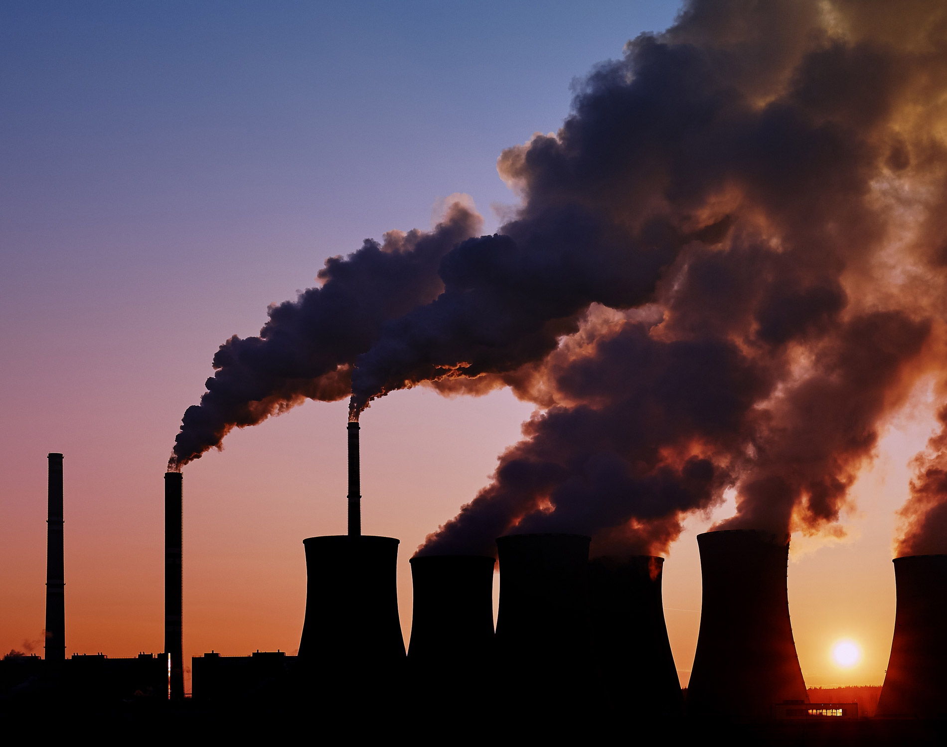 coal fired power station silhouette at sunset, Pocerady, Czech republic