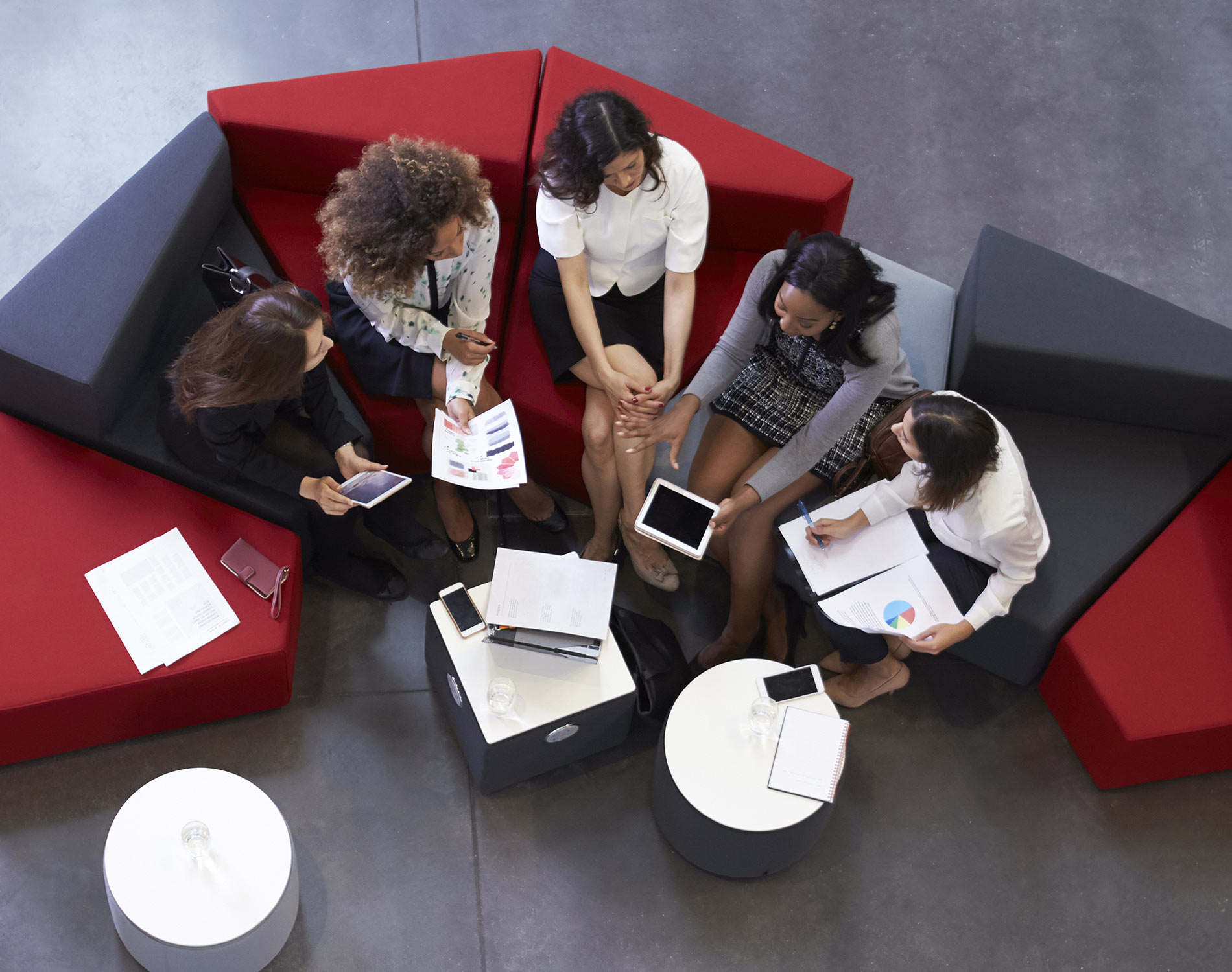 Overhead shot of businesswomen meeting in lobby