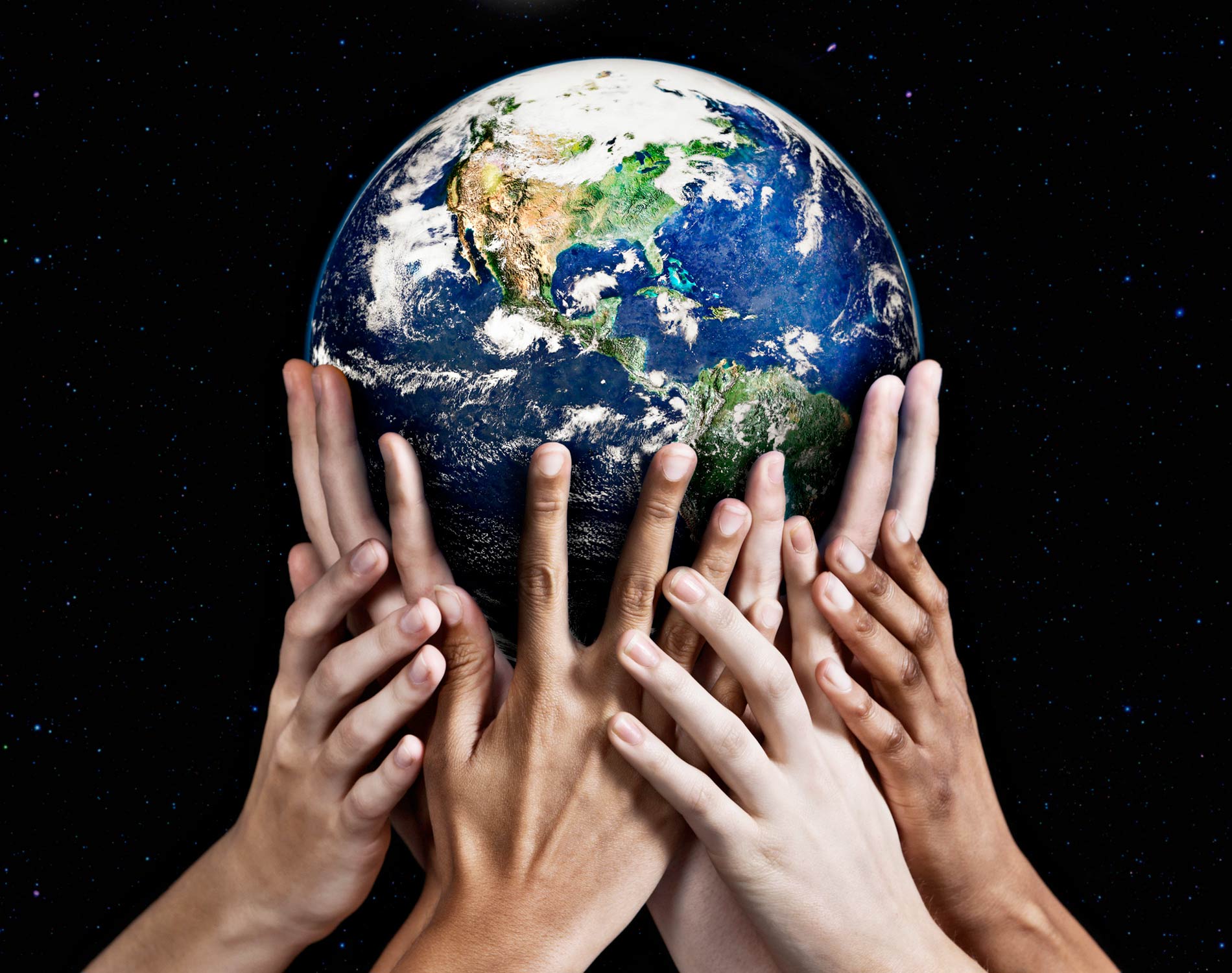 Hands holding Earth