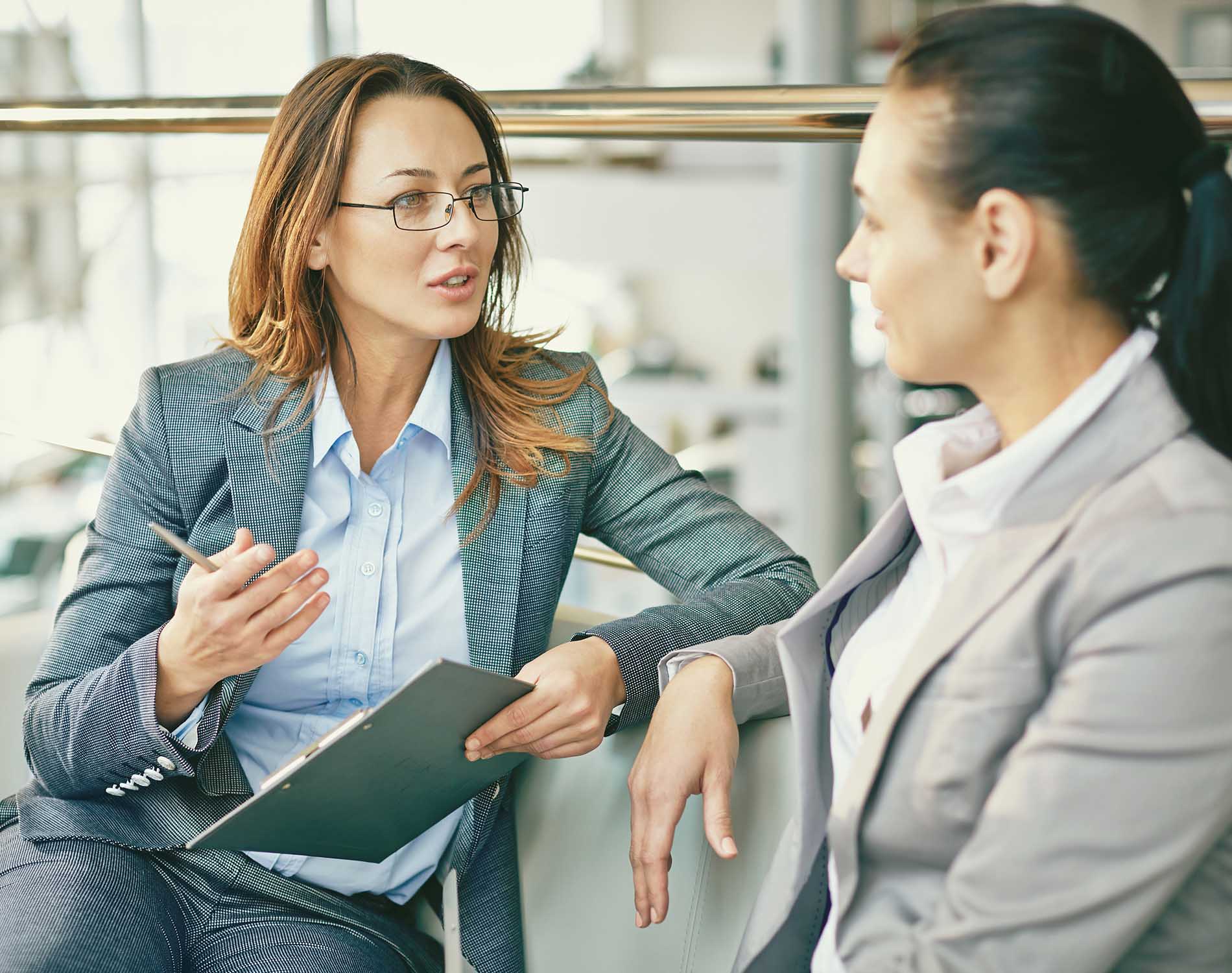 Two women at a meeting