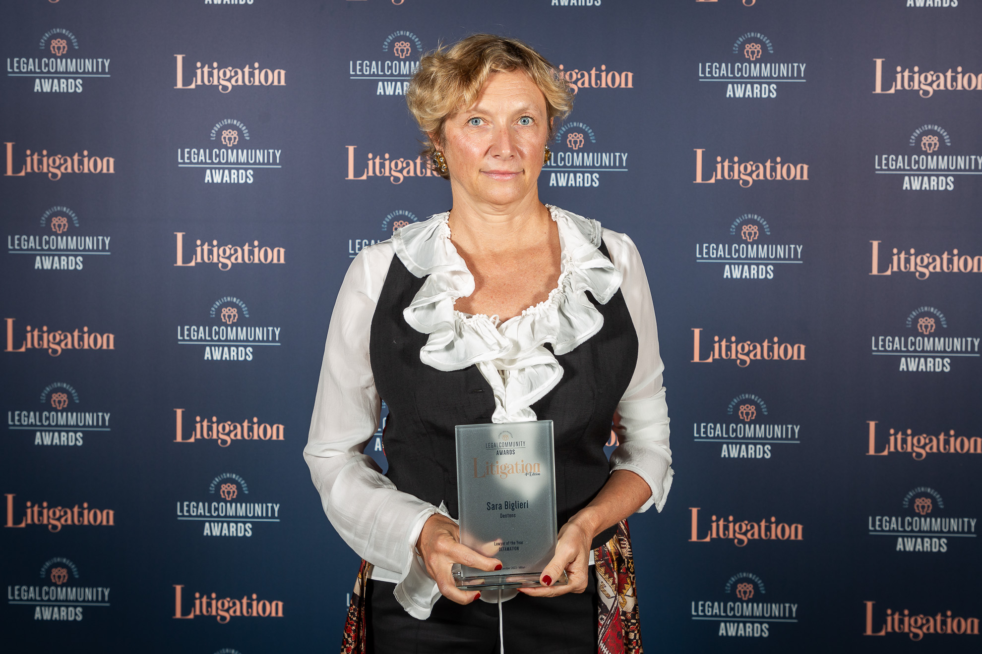 Legal community Litigation Awards - Sara Biglieri with an award